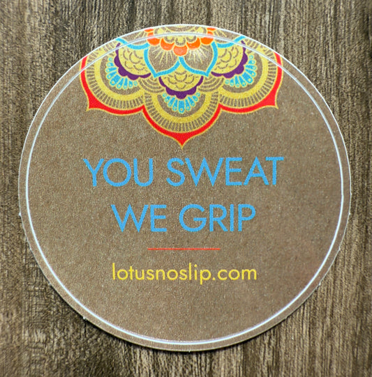 2-inch glossy circular Lotus NoSlip sticker with “You Sweat. We Grip.” slogan – durable and water-resistant yoga decal for personal items and gear.